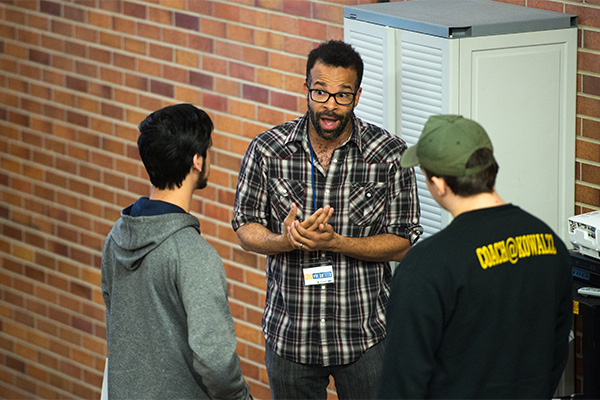 Doug Kearney talking with High Schoolers